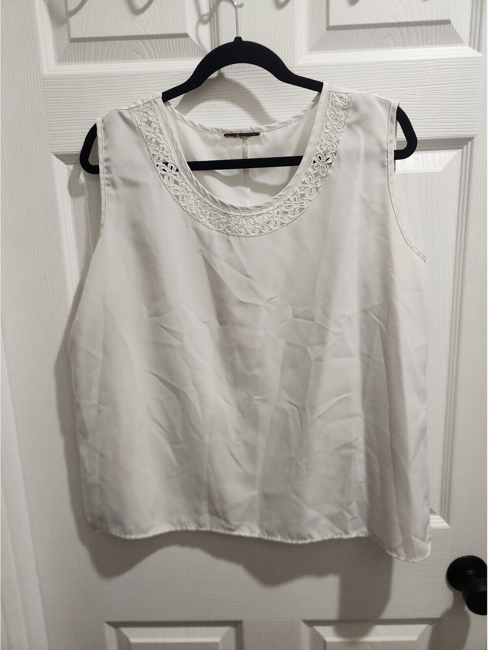White Sleeveless Blouse with Embroidered Neckline